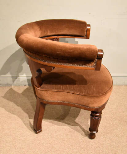 Mid 19th century walnut library armchair