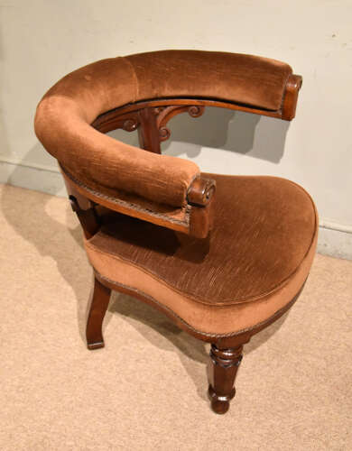 Mid 19th century walnut library armchair