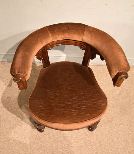 Mid 19th century walnut library armchair