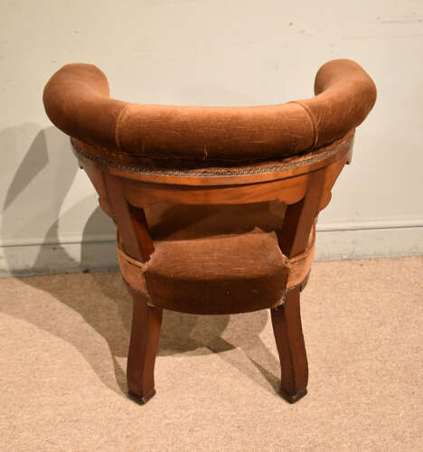 Mid 19th century walnut library armchair