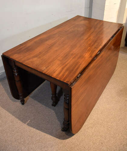 Regency period large drop leaf mahogany dining table