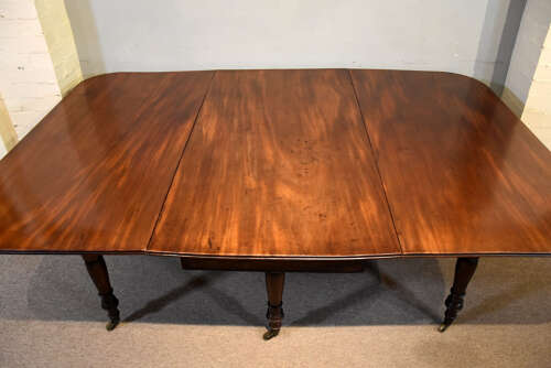 Regency period large drop leaf mahogany dining table