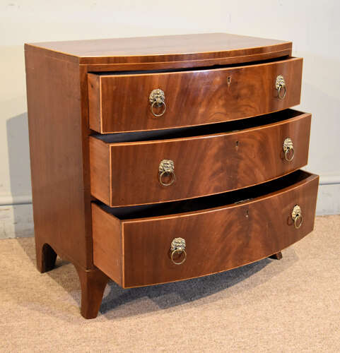Regency bow fronted miniature chest of drawers