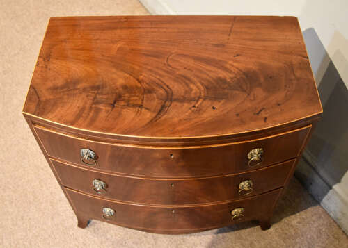 Regency bow fronted miniature chest of drawers